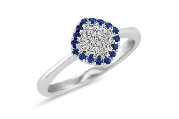 Triangle shaped blue sapphire and diamond cluster engagement ring.
