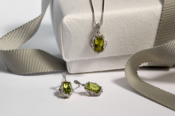 Emerald shaped Peridot and Diamond necklace and matching earrings.
