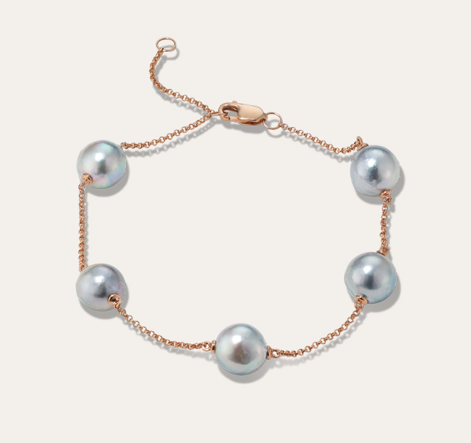 Blue Akoya Pearl Station Bracelet. soft blue luster, these baroque cultured Akoya pearls seem to float along a vivid 14-karat rose gold diamond cut cable chain in this stylish station bracelet. 5 baroque cultured blue Akoya pearls at 7-8mm, Station design, 8-inch adjustable diamond cut cable chain