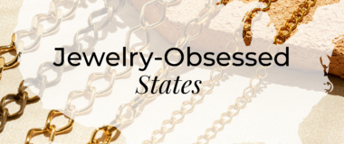 The header image features the title "Jewelry-Obsessed States" in bold black text. The background consists of various gold chains laid out on a light surface, with the chains casting shadows. There is a subtle map outline behind the text, adding to the theme of different states. The overall design has a luxurious and elegant feel, highlighting the focus on jewelry.